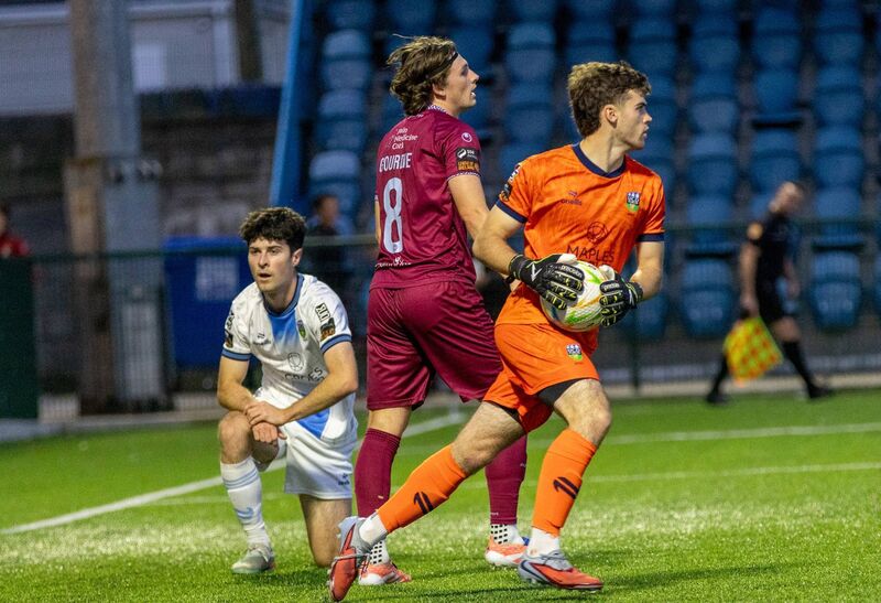 UCD keeper Noah Douglas catches shot from Cobh Ramblers' Rhys Gourdie in St Colman's Park. Picture: Adam Sheehan UCD keeper Noah Douglas catches shot from Cobh Ramblers' Rhys Gourdie in St Colman's Park. Picture: Adam Sheehan