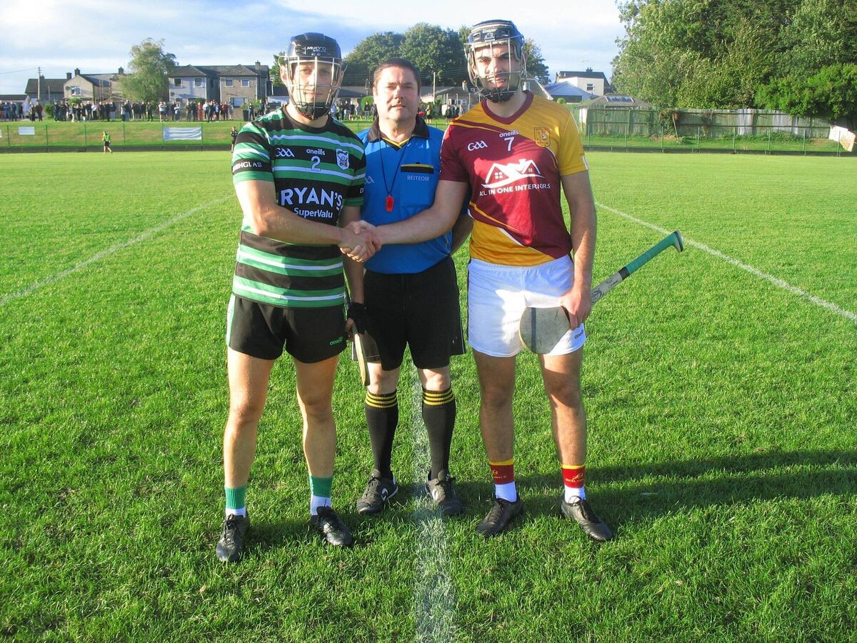 Referee David Daly with Shane O'Donoghue (Douglas) and Mark Callanan (Whitechurch) at Ballinlough. Referee David Daly with Shane O'Donoghue (Douglas) and Mark Callanan (Whitechurch) at Ballinlough.
