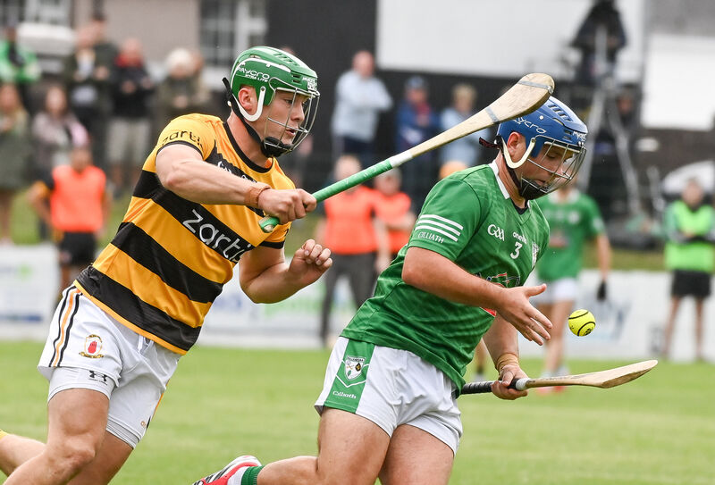  Killeagh's Jamie Fogarty tries to get away from Kevin Moynihan of Na Piarsaigh. Picture: David Keane.