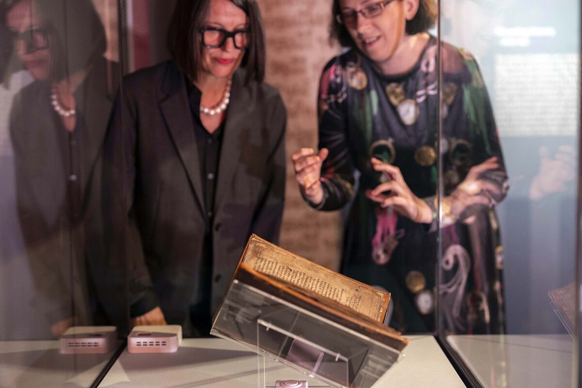 Elaine Harrington, UCC library with Liz Jolly university librarian with the annals which are currently on display in the Glucksman. Picture: Clare Keogh
