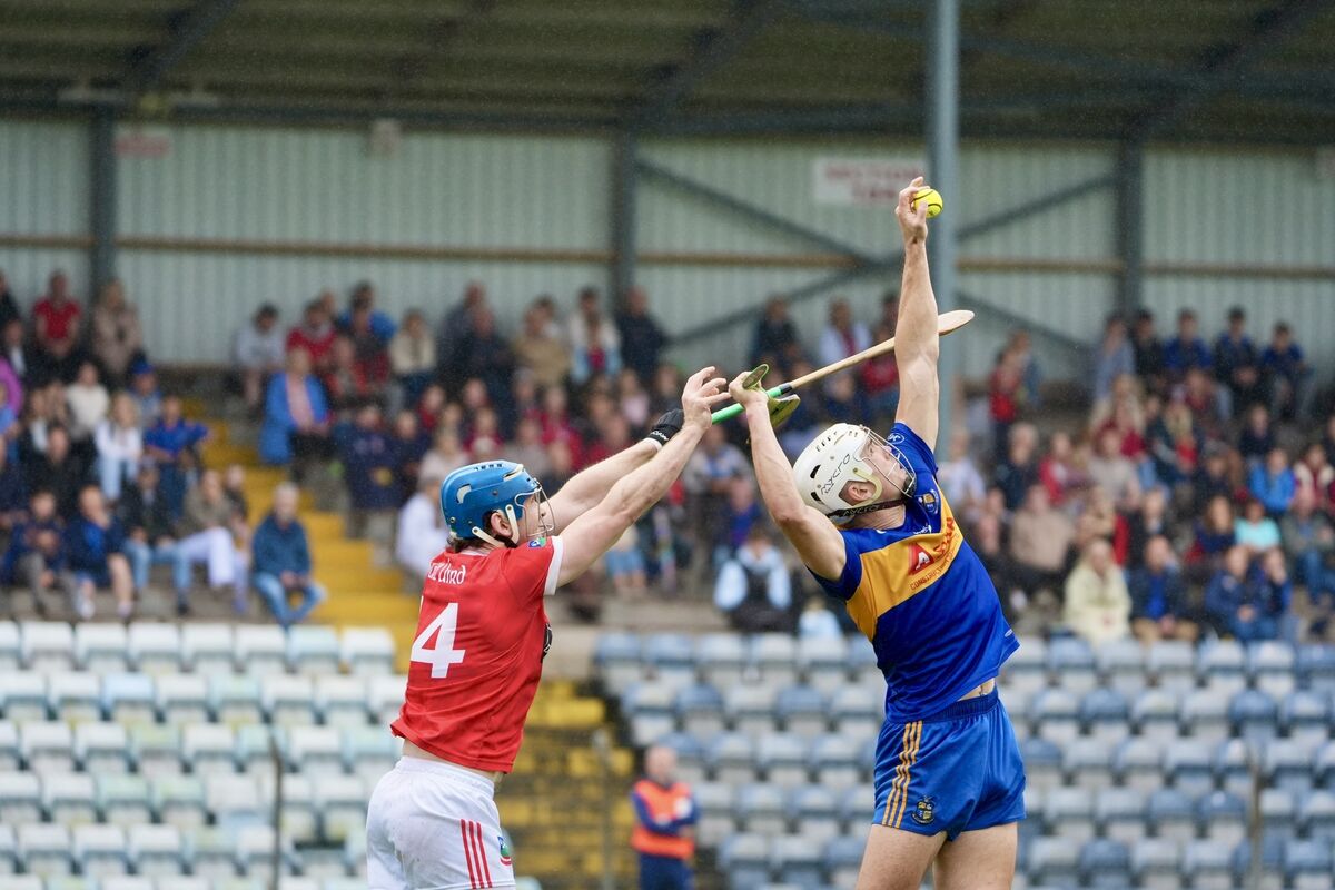 Carrigaline’s Dave Griffin gets to the high ball ahead of Kilworth Will Condon. Picture: Noel Sweeney