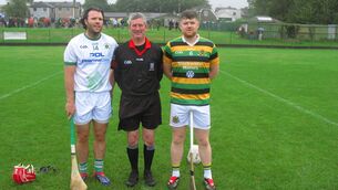 <p>Referee Mark Maher accompanied by Niall McCarthy (Passage) and Jamie Corkery (Glen Rovers) </p>