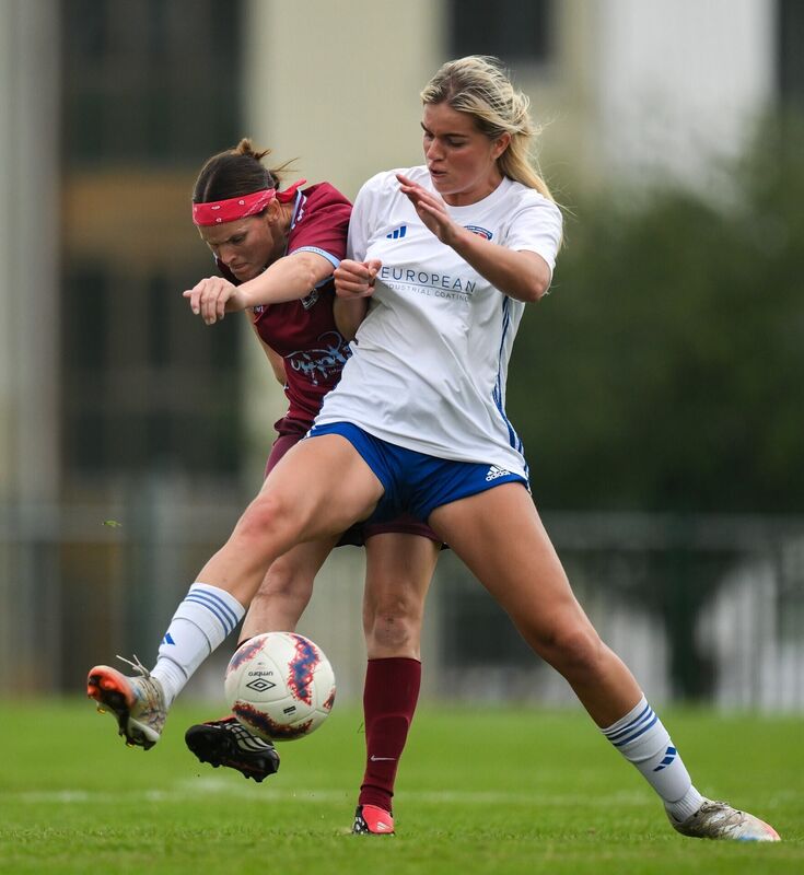 Josie Dwyer of Ferns United is tackled by Jesse Mendez of Wilton United. Picture: Brendan Moran/Sportsfile
