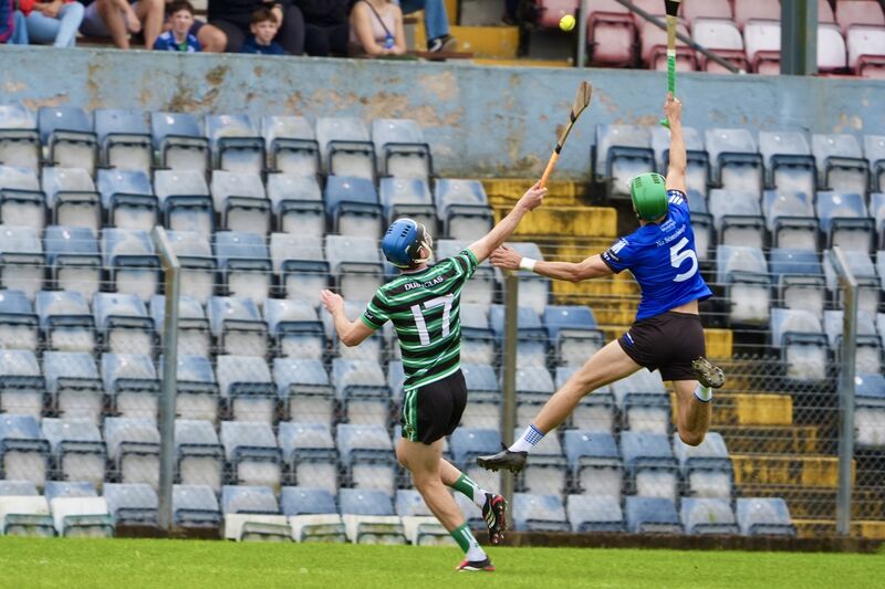  Douglas’ Charlie Lucas and Sarsfields' Craig Leahy contest aerial possession. Picture: Noel Sweeney