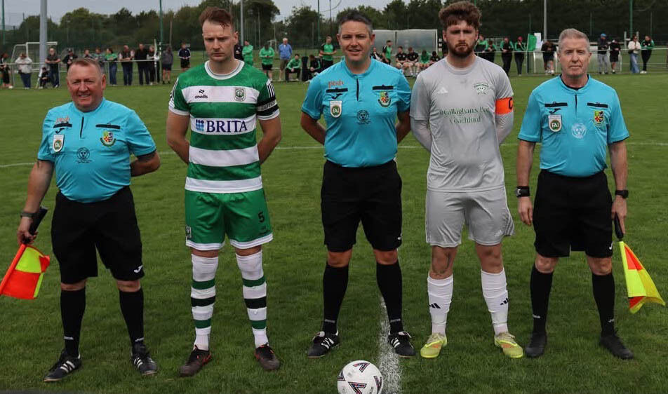 Adam Conroy is flanked by Trim Celtic's captain Tadgh Bradley (left) and Coachford's Adam Murphy. Also in picture are Paul Shelley and Josheph O'Hanlon. Adam Conroy is flanked by Trim Celtic's captain Tadgh Bradley (left) and Coachford's Adam Murphy. Also in picture are Paul Shelley and Josheph O'Hanlon.