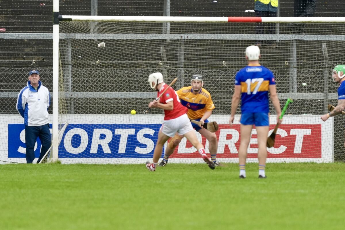 Kilworth's Luke Carey hits the net against Carrigaline. Picture: Noel Sweeney