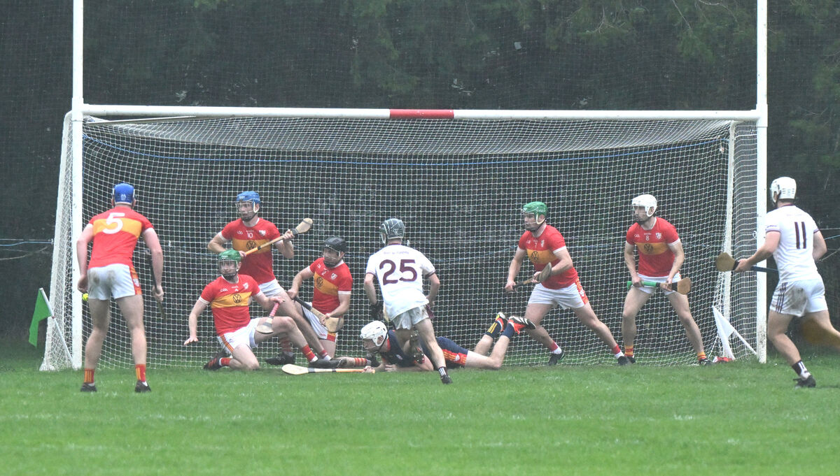 Éire Óg keep out a free late in the second half against Bishopstown. Picture: Larry Cummins Éire Óg keep out a free late in the second half against Bishopstown. Picture: Larry Cummins