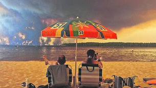 <p class="contextmenu internal_Caption">People on a beach in Lacanau, south-west France, in July, 2026, as clouds of smoke rise into the sky from a wildfire</p> <p class="contextmenu internal_Caption">People on a beach in Lacanau, south-west France, in July, 2026, as clouds of smoke rise into the sky from a wildfire</p>