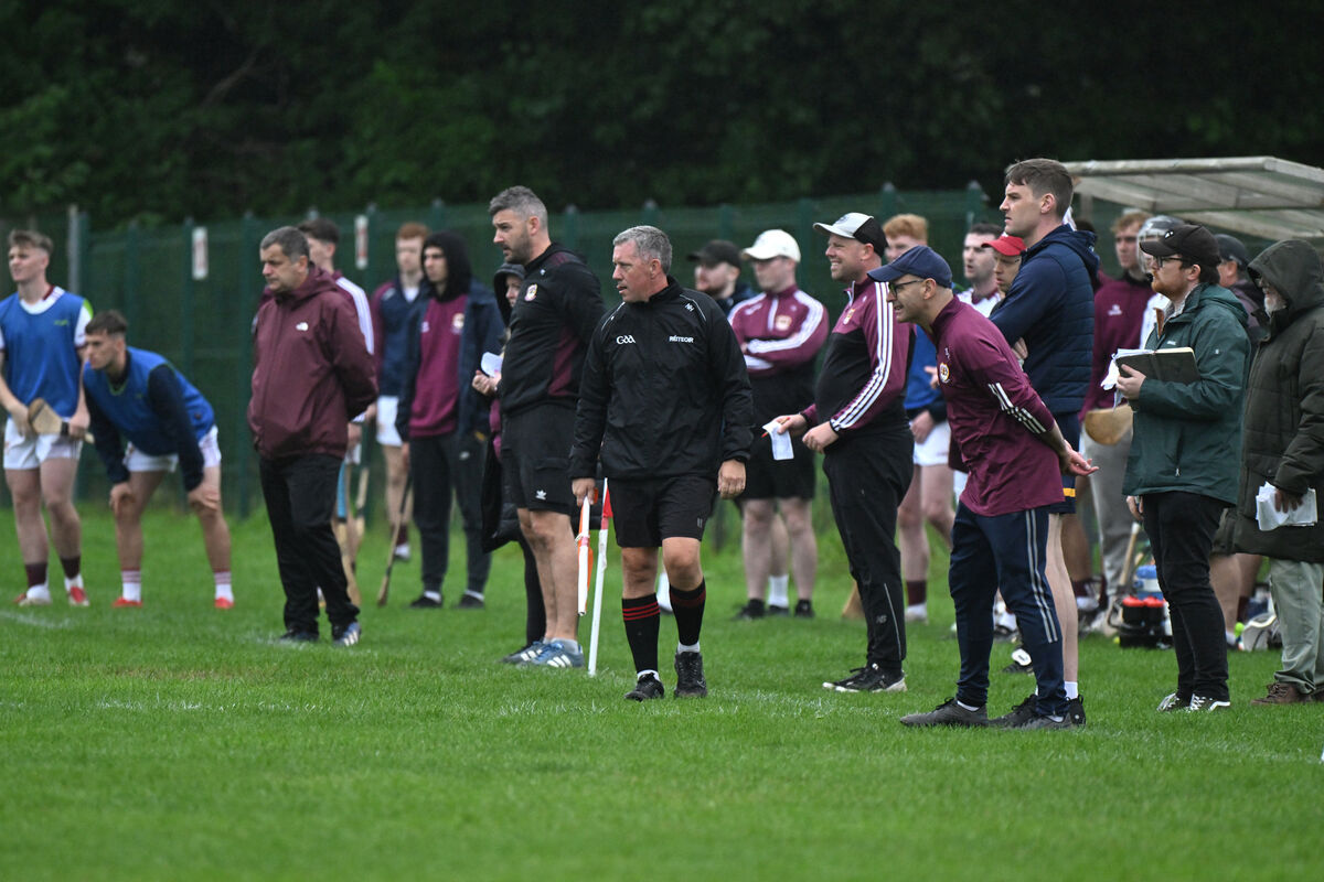  Bishopstown management eye the action on the pitch. Picture: Larry Cummins