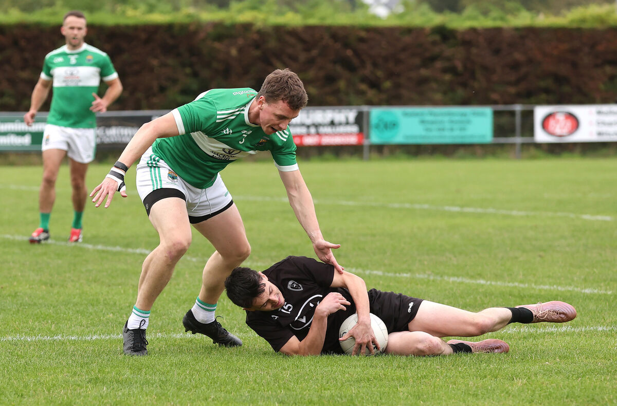 Shane O'Riordan, Kiskeam, is tackled by Rory Buckley, Macroom. Picture: Jim Coughlan. Shane O'Riordan, Kiskeam, is tackled by Rory Buckley, Macroom. Picture: Jim Coughlan.