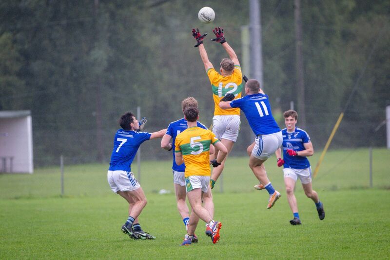 Bantry’s Sean O’Leary and Glanmire’s Harry Cogan contest in the air. Picture: Chani Anderson