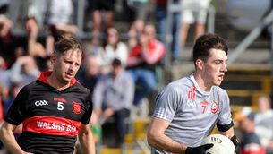 <p>Dromtarriffe's Thomas Howard racing clear of Mitchelstown's Joseph O'Sullivan in their 2022 meeting. Picture: Denis Minihane.</p>