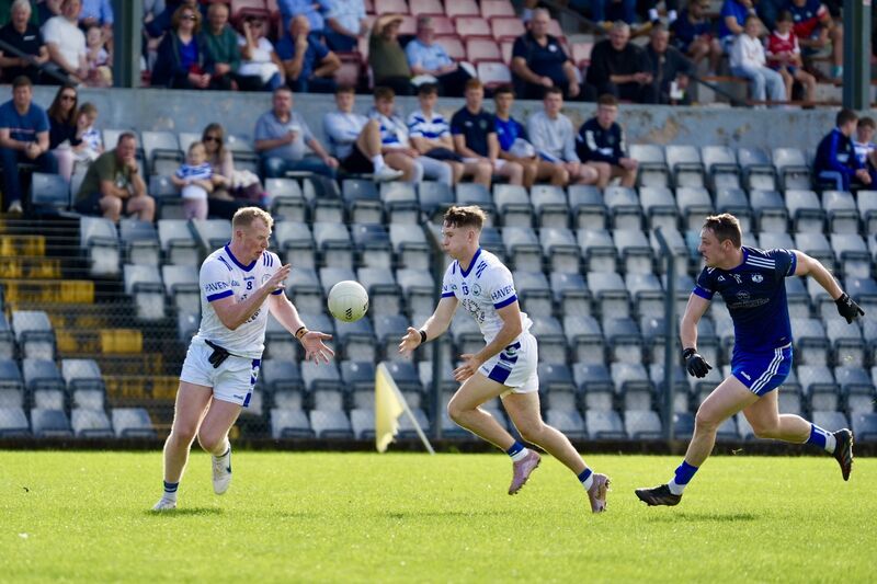 Micheál Maguire passes to his Castlehaven teammate Conor Cahalane. Picture: Noel Sweeney Micheál Maguire passes to his Castlehaven teammate Conor Cahalane. Picture: Noel Sweeney