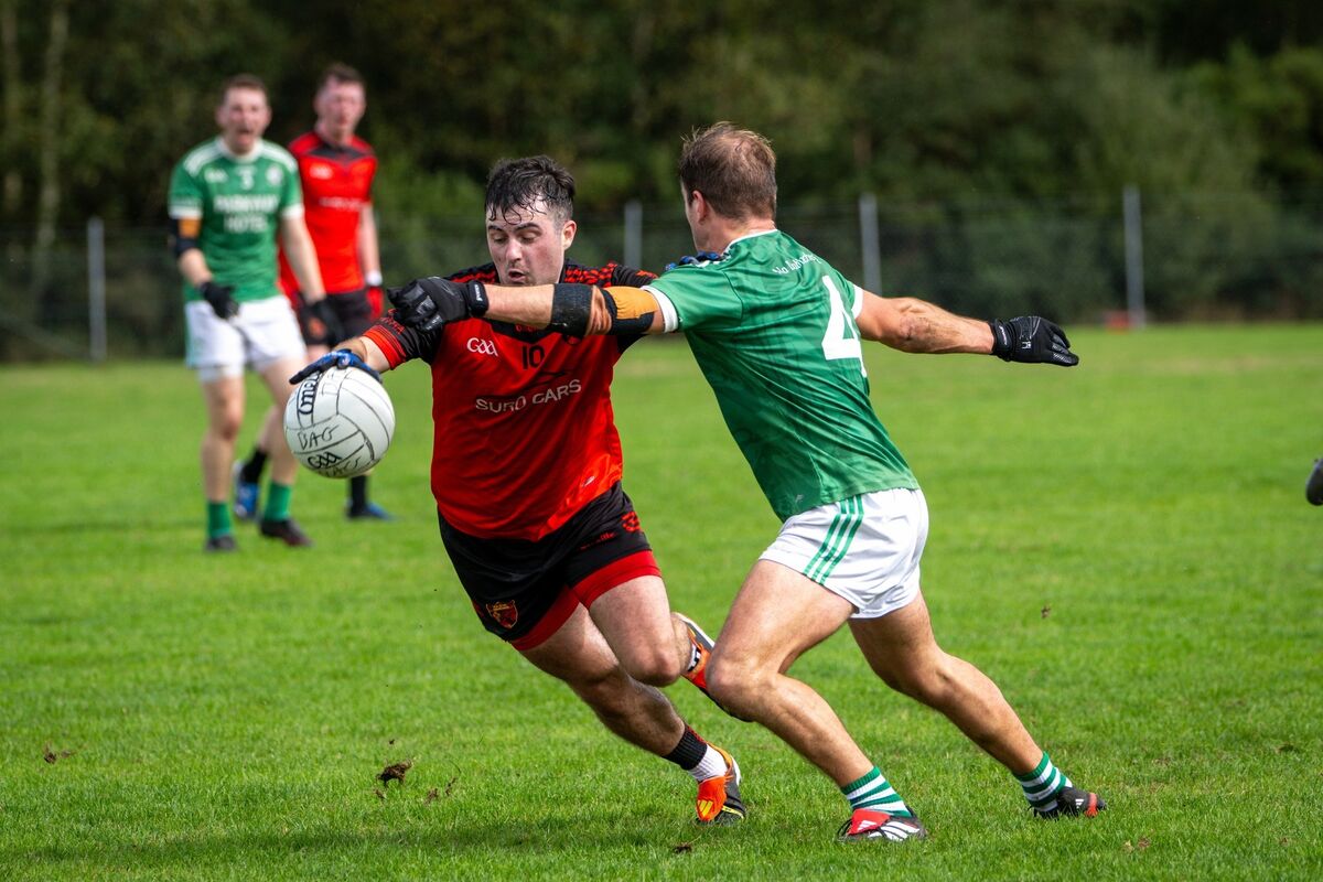 Béal Átha an Ghaorthaidh's Daire Ó Ceallacháin takes on Dohenys' Jerry Farrell. Picture: Chani Anderson
