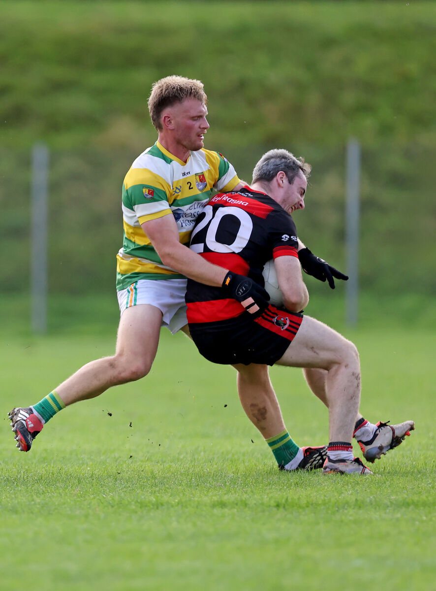 Cian Daly, Carbery Rangers, tackles Tadhg Ryan, Newmarket. Picture: Jim Coughlan. Cian Daly, Carbery Rangers, tackles Tadhg Ryan, Newmarket. Picture: Jim Coughlan.