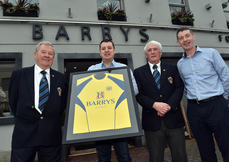 Dinny Carroll, (left) president Douglas Hall and Brian Kennedy, club chairman , presenting a framed club jersey to club sponsors Peter Collins, proprietor Barrys and Michael Gilmartin, manager Dinny Carroll, (left) president Douglas Hall and Brian Kennedy, club chairman , presenting a framed club jersey to club sponsors Peter Collins, proprietor Barrys and Michael Gilmartin, manager