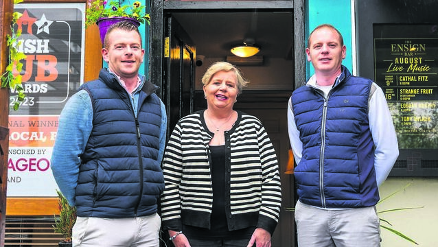 <p class="contextmenu internal_Caption">Dan Boland, mum Cecelia, and brother Gavin outside The Ensign in Monsktown. 	<span class="contextmenu emphasis CaptionCredit">Picture: Noel Sweeney</span>
            </p>