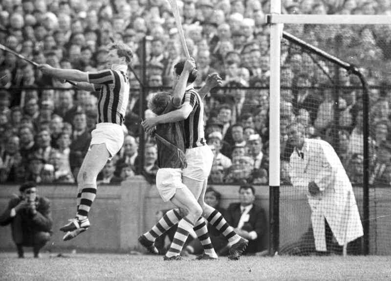 All-Ireland Hurling Final 1966:  Cork v Kilkenny:  Gerald McCarthy, Cork captain being well blocked by Kilkenny's Claus Dunne. 