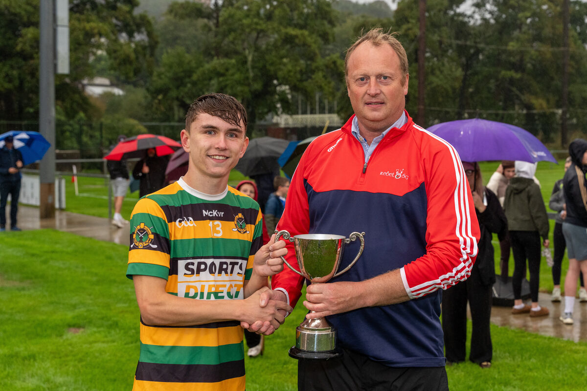 Peter Watson from Rebel Óg presents the cup to Glen Rovers U16 captain Cillian McGuickin. Picture by Noel Sweeney Peter Watson from Rebel Óg presents the cup to Glen Rovers U16 captain Cillian McGuickin. Picture by Noel Sweeney