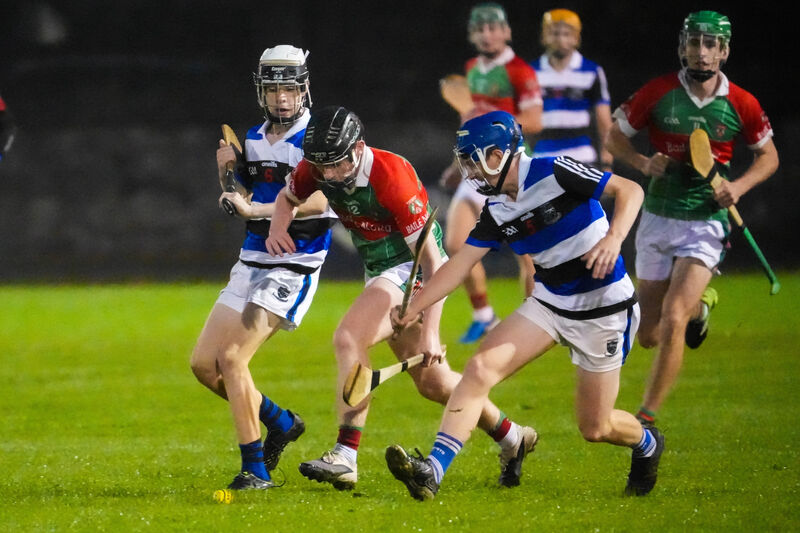 Kiel O’Mahony of Ballinora and Ballyhea Milford’s Eddie Broderick battle for possession. Picture by Noel Sweeney