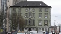 Claim that patient sitting outside Mercy Hospital was struck repeatedly with iron bar