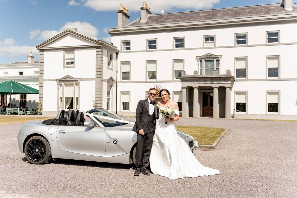 “I used my dad’s car on the day, and then, after we where married, a lovely man my now mother-in-law knows, let us use his BMW convertible for the rest of the day. The kindest thing to do for us,” said Emma. “I used my dad’s car on the day, and then, after we where married, a lovely man my now mother-in-law knows, let us use his BMW convertible for the rest of the day. The kindest thing to do for us,” said Emma.