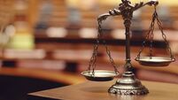 Cork man charged with shop robbery allegedly told woman he would stab her in the neck