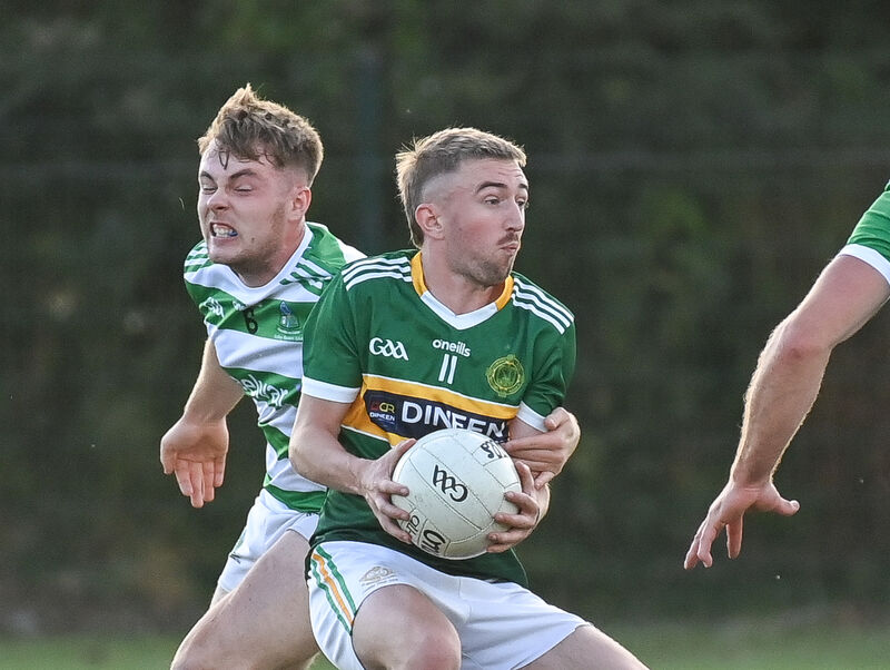 St Michael's Adam Hennessy keeps possession under pressure from Valley Rovers' Cian Johnson. Picture: David Keane St Michael's Adam Hennessy keeps possession under pressure from Valley Rovers' Cian Johnson. Picture: David Keane