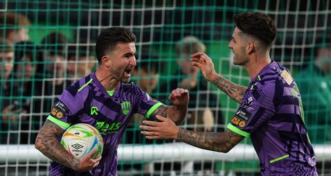 Seani Maguire celebrates with Ruairi Keating after scoring his side's first goal 4/9/2026