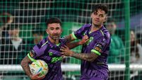 Seani Maguire celebrates with Ruairi Keating after scoring his side's first goal 4/9/2026