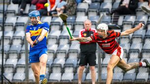 <p>Carrigaline’s Brian Kelleher gets his shot away as Cloyne’s Adam Sherlock closes in during Saturday's Co-op SuperStores Premier IHC quarter-final at Páirc Uí Rinn. Picture: Chani Anderson</p> <p>Carrigaline’s Brian Kelleher gets his shot away as Cloyne’s Adam Sherlock closes in during Saturday's Co-op SuperStores Premier IHC quarter-final at Páirc Uí Rinn. Picture: Chani Anderson</p>