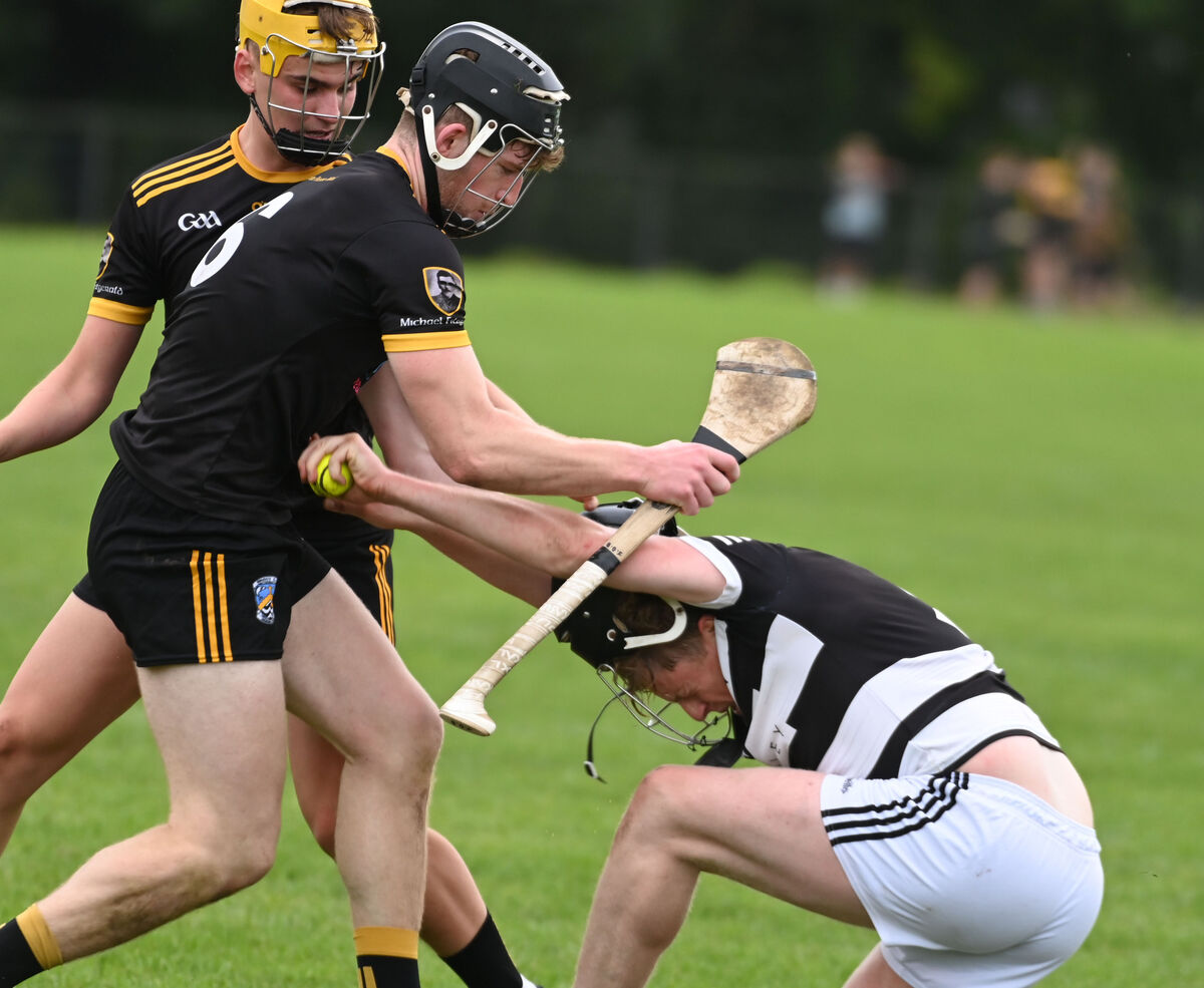 Ballyhea's Cathal Crowley is tackled by Fermoy's James O'Brien. Picture: Eddie O'Hare Ballyhea's Cathal Crowley is tackled by Fermoy's James O'Brien. Picture: Eddie O'Hare
