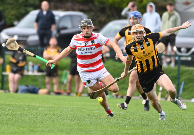 Ballygiblin's Joseph O'Sullivan and Russell Rovers' Luke Duggan-Murray in a race for possession. Picture: Eddie O'Hare