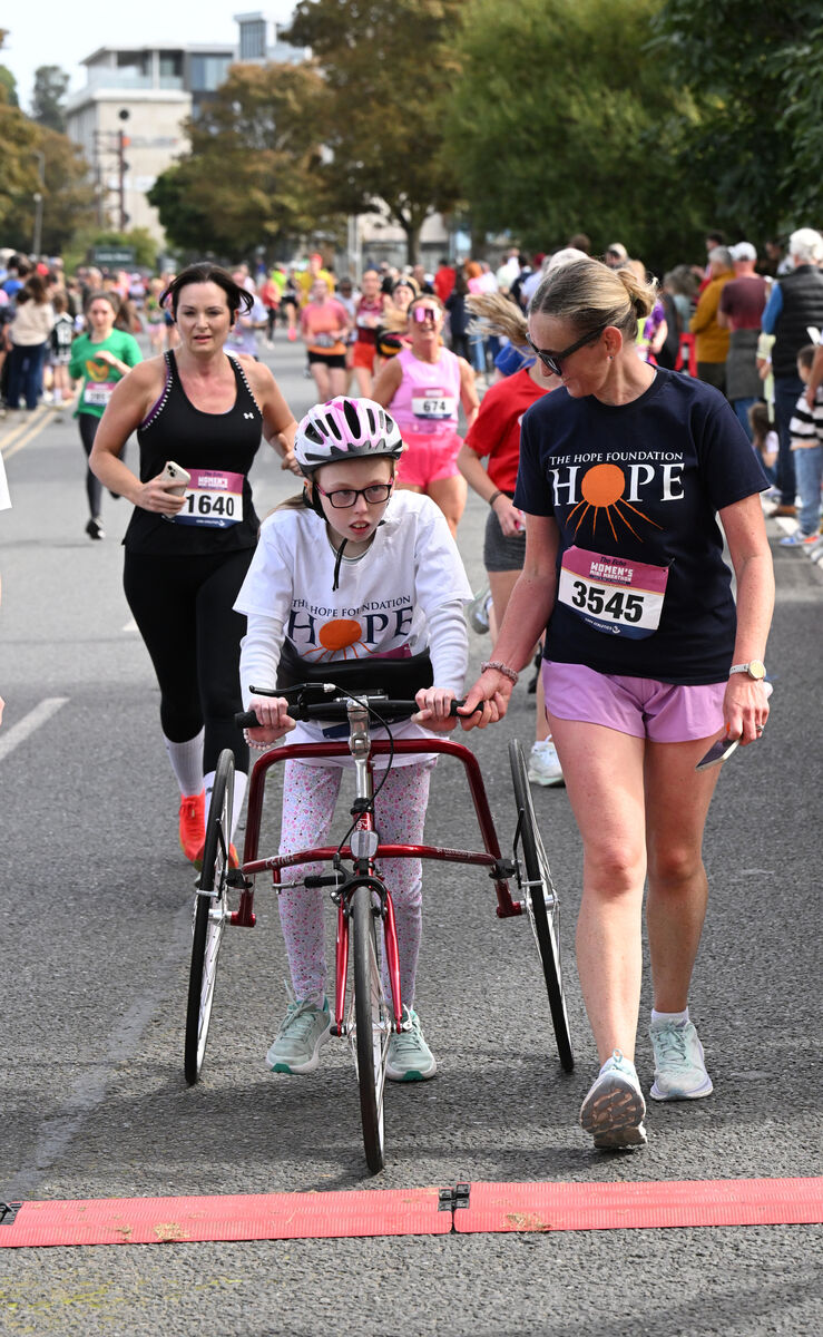 Isobel Twomey and mum Rowena, Midleton, at the finish line at Kennedy Park after The Echo Women's Mini-Marathon 2026. Picture: Larry Cummins Isobel Twomey and mum Rowena, Midleton, at the finish line at Kennedy Park after The Echo Women's Mini-Marathon 2026. Picture: Larry Cummins