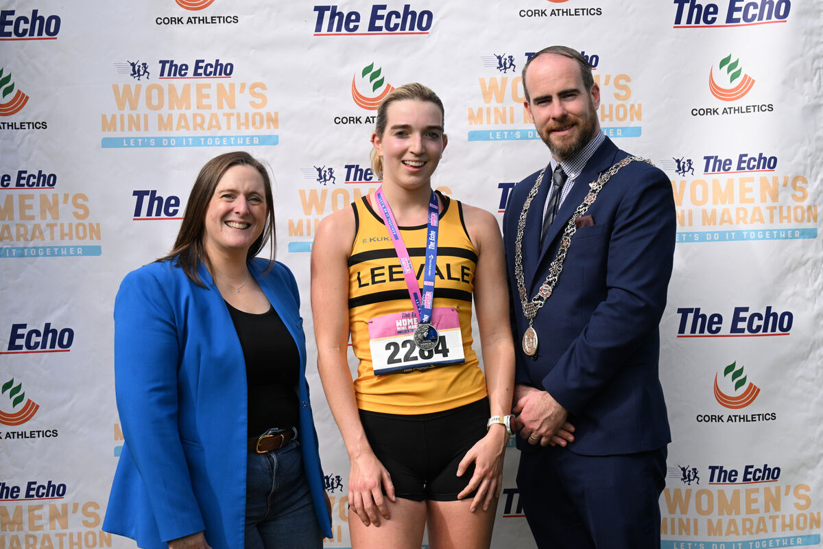 Hannah Smith of Leevale was second in The Echo Women's Mini-Marathon 2026, pictured with Mary Corcoran of The Echo and Cllr Gary O'Brien, deputising for the Lord Mayor. Picture; Larry Cummins Hannah Smith of Leevale was second in The Echo Women's Mini-Marathon 2026, pictured with Mary Corcoran of The Echo and Cllr Gary O'Brien, deputising for the Lord Mayor. Picture; Larry Cummins