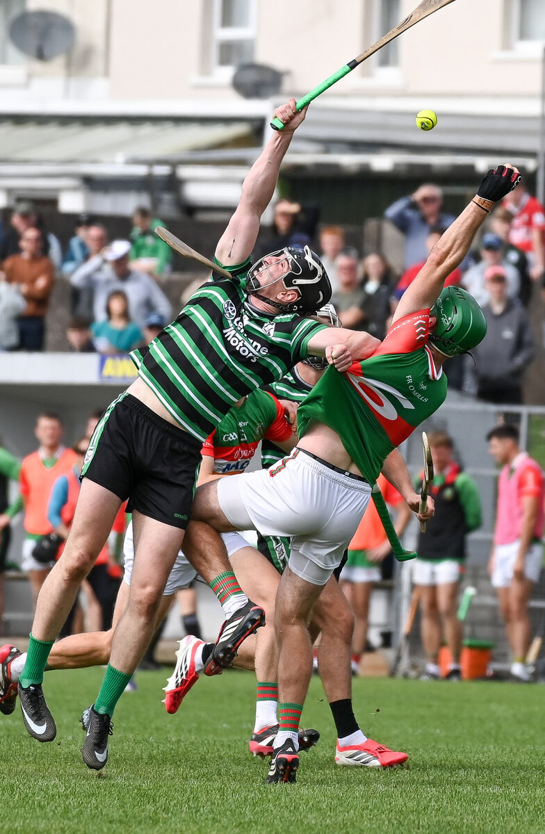  Fr O'Neill's Daniel Harrington battles in the air with Douglas' Joe Harte during their Premier SHC relegation playoff match at Carrigtwohill. Picture: David Keane.