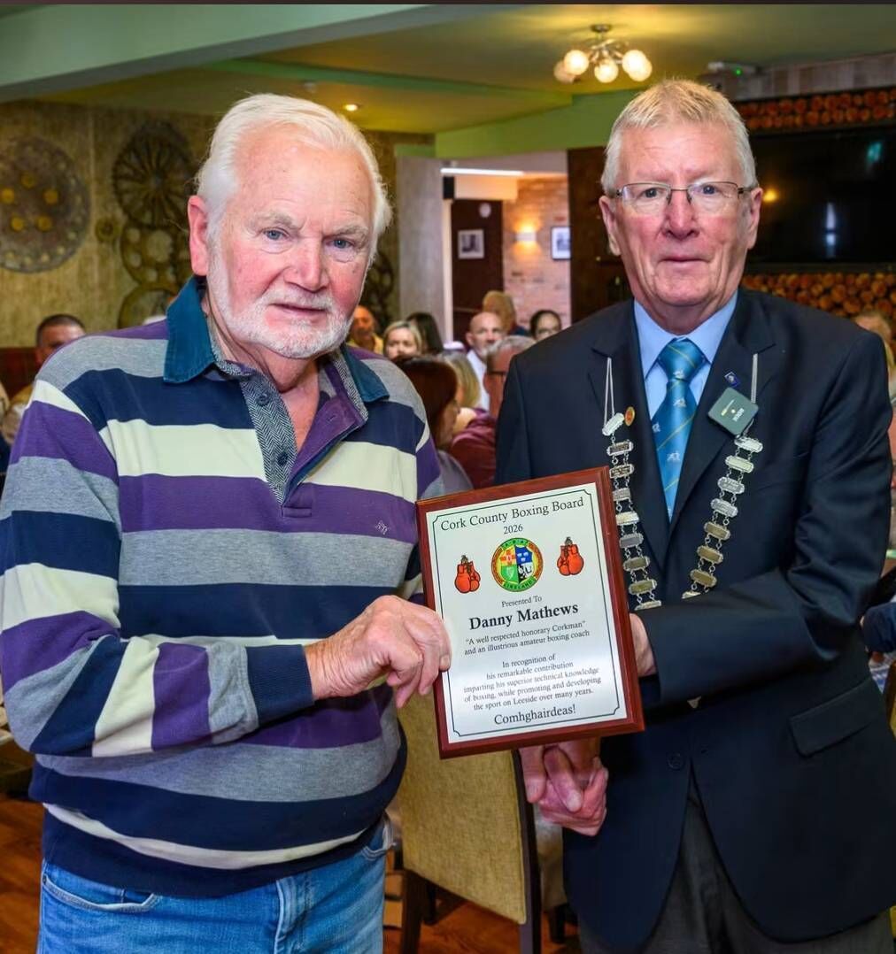 Danny Matthews is presented with his Recognition Plaque by Cork Ex-Boxers president Dan O'Connell Danny Matthews is presented with his Recognition Plaque by Cork Ex-Boxers president Dan O'Connell