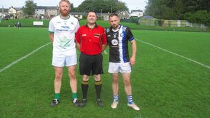 <p>Referee David Dlay accompanied by James Kind (Passage) and Danny Moore (Ballyphehane) </p> <p>Referee David Dlay accompanied by James Kind (Passage) and Danny Moore (Ballyphehane) </p>