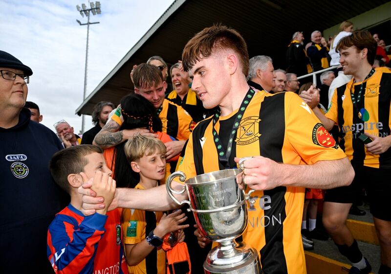 Evan Cummins of Cobh Wanderers celebrates with fans after the 2026 FAI Intermediate Cup Final between Cobh Wanderers and St Mary's at Munster FA Turners Cross Stadium in Cork. Photo by Eakin Howard/Sportsfile