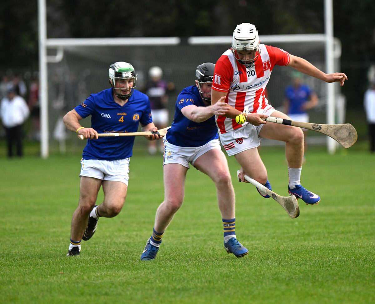 Imokilly's Billy McGann tries to skip over a challenge from Conor Cahalane, St Finbarr's. Picture: Larry Cummins Imokilly's Billy McGann tries to skip over a challenge from Conor Cahalane, St Finbarr's. Picture: Larry Cummins