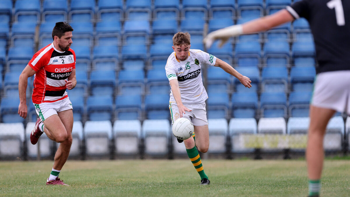 JP Murphy, Ballincollig, closes in on Adam Hennessy, St Michael's. Picture: Jim Coughlan. JP Murphy, Ballincollig, closes in on Adam Hennessy, St Michael's. Picture: Jim Coughlan.