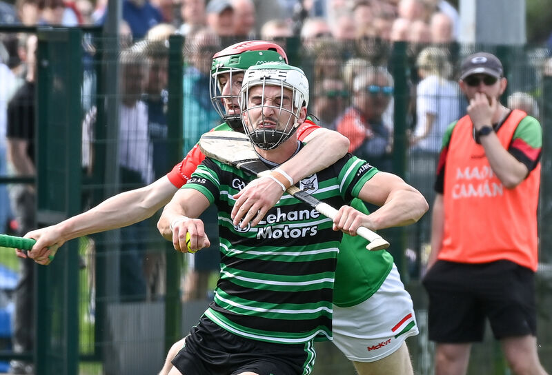  Douglas' Shane Kingston is tackled by Fr O'Neill's Joe Millerick. Picture: David Keane.