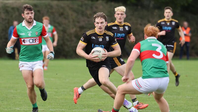 Fermoy's Pádraig de Róiste in action against Ronan Barrow of Ballinora. Picture: Brendan Barrett Fermoy's Pádraig de Róiste in action against Ronan Barrow of Ballinora. Picture: Brendan Barrett