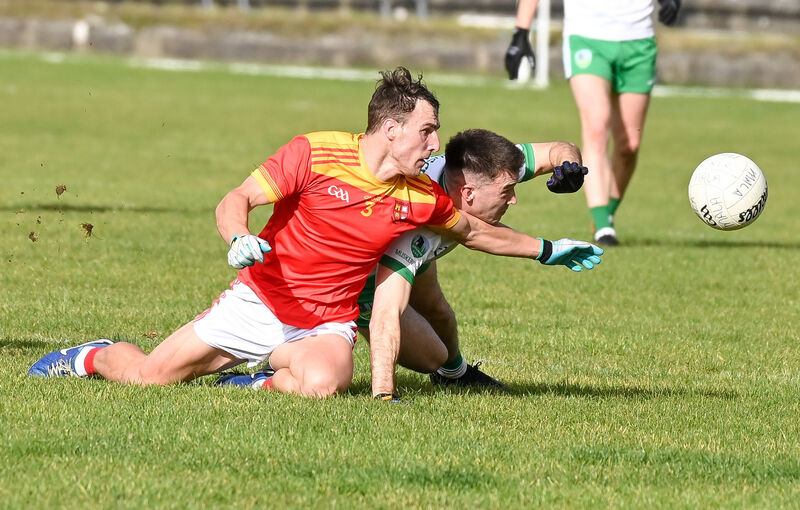  Mallow's Paul Lyons and Muskerry's Eolan O'Leary battle for possession in 2024. Picture: David Keane
