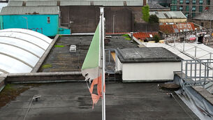 <p> A frayed and discoloured national tricolour flag is currently flying at the Bus Station at Parnell Place, Cork City. Picture: Larry Cummins</p>