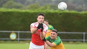 <p>Adam Buckley of Dromtarriffe in action in midfield against Adrian Murphy, Boherbue, in the 2023 IAFC quarter-final. Picture: Larry Cummins</p>