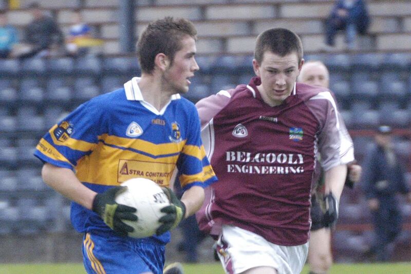 Carrigaline's Niall Coakley looks for support as Evan Allen of Sliabh Rua closes in. Picture: Howard Crowdy