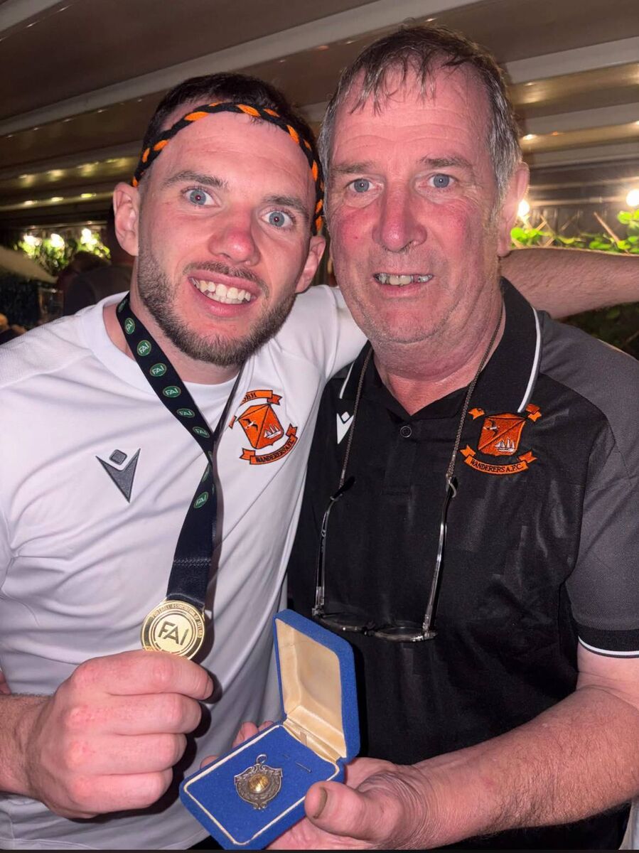 George Keating pictured with his father Paul displaying both of their intermediate cup medals Photographer: Shaun Daly Photogrpahy George Keating pictured with his father Paul displaying both of their intermediate cup medals Photographer: Shaun Daly Photogrpahy