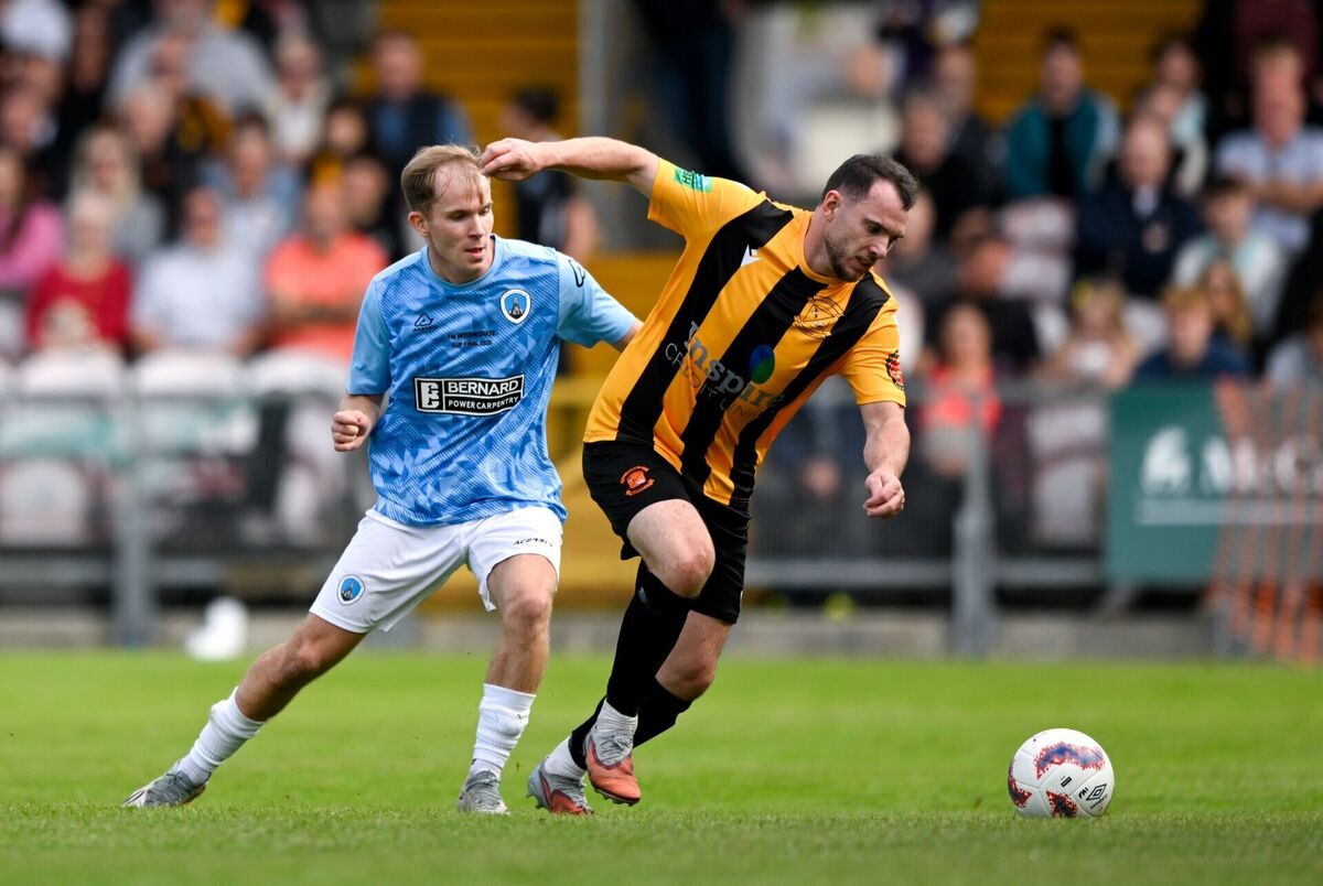 George Keating of Cobh Wanderers in action against Fionn Kelly of St Mary's AFC during the 2026 FAI Intermediate Cup Final between Cobh Wanderers and St Mary's at Munster FA Turners Cross Stadium in Cork. Photo by Eakin Howard/Sportsfile George Keating of Cobh Wanderers in action against Fionn Kelly of St Mary's AFC during the 2026 FAI Intermediate Cup Final between Cobh Wanderers and St Mary's at Munster FA Turners Cross Stadium in Cork. Photo by Eakin Howard/Sportsfile