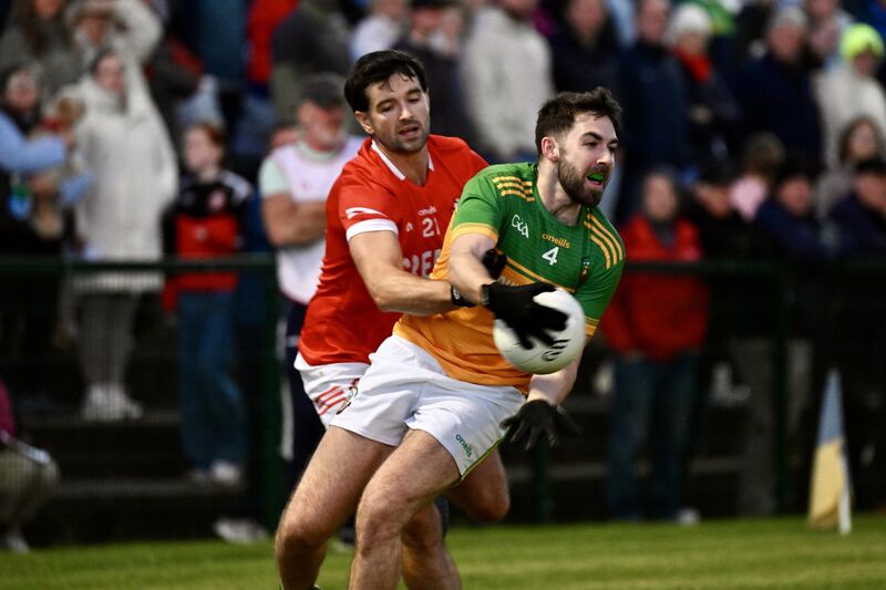  Boherbue defender Jack Daly is tackled by Daniel O’Keeffe of Dromtariffe. Picture: Larry Cummins